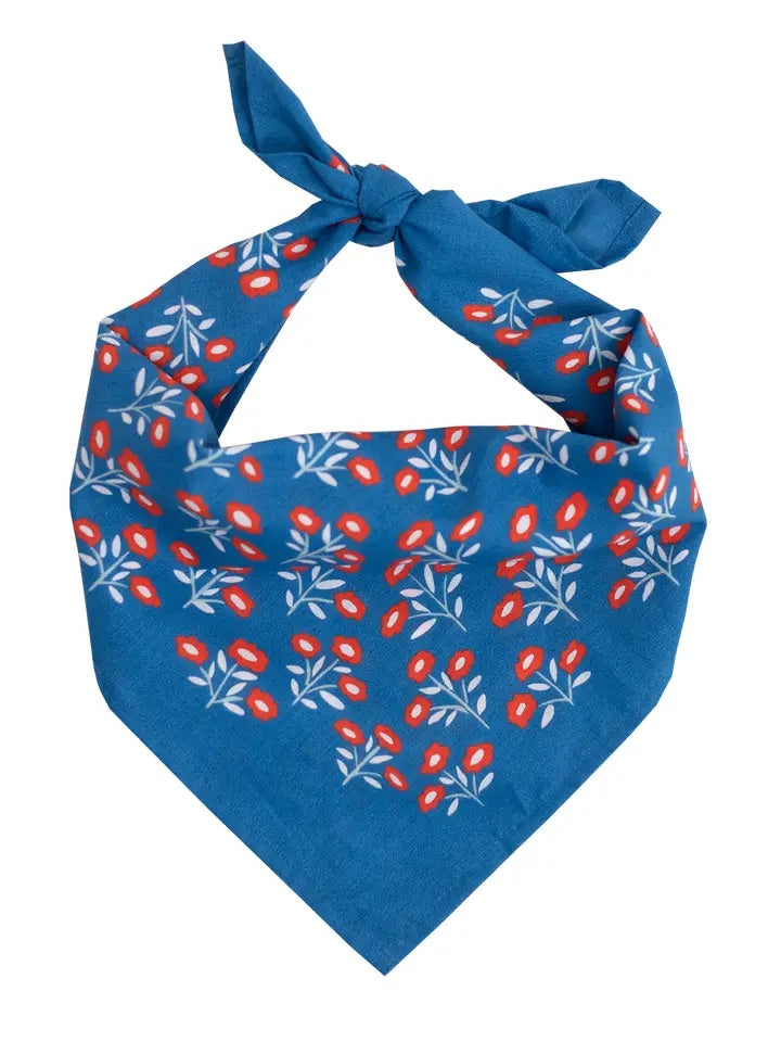 Front view of Juliet bandana No 075 showcasing blue cotton with red and white floral print tied at top on white background