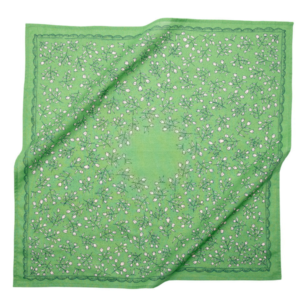Green floral patterned square scarf.