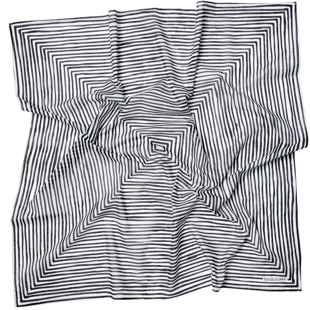 Crinkled square scarf with black concentric striped squares; label reads 'Hemlock 093'.