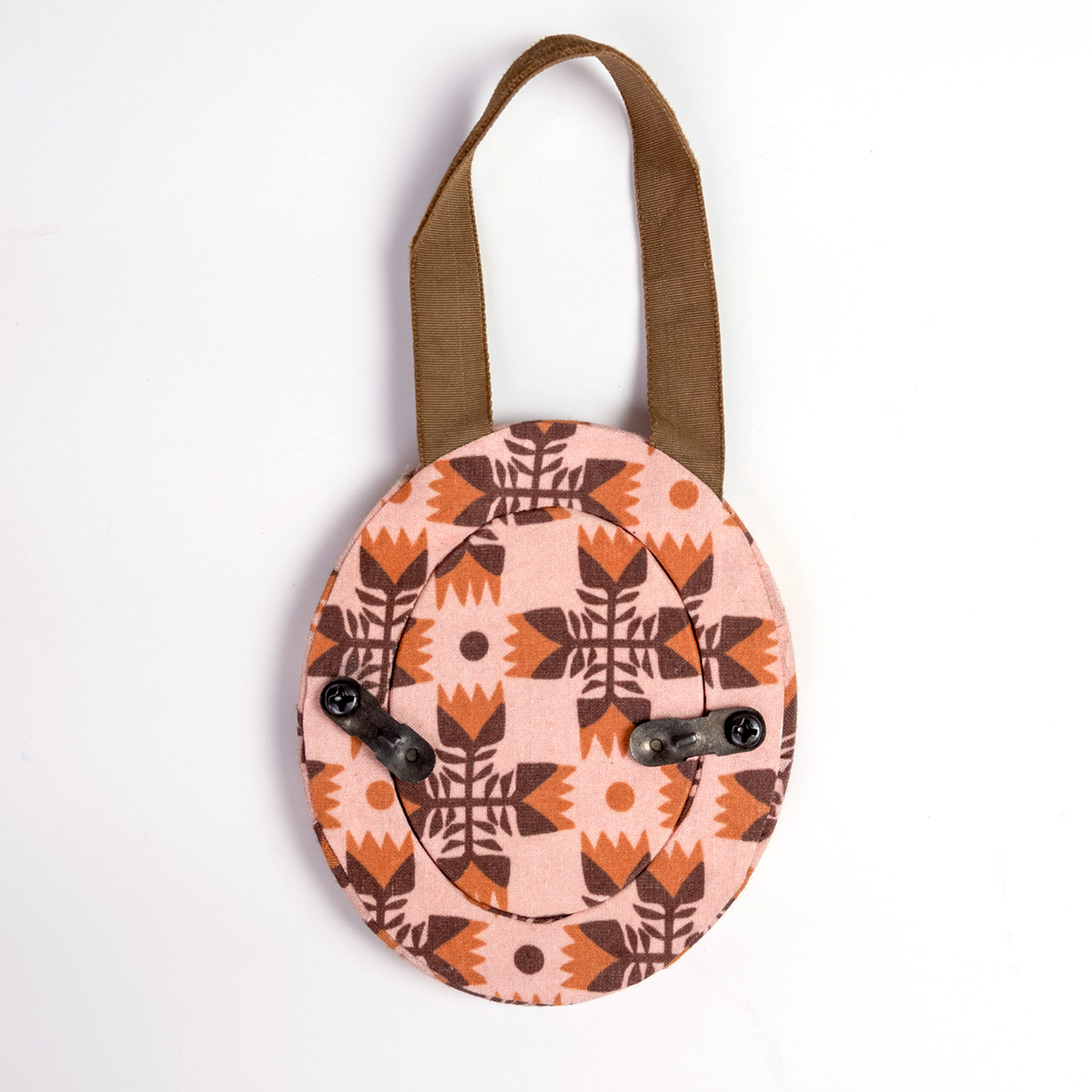 Back view of Sarah Pink Fabric Frame ornament showcasing metal swivel photo tabs and brown hanging ribbon on white background