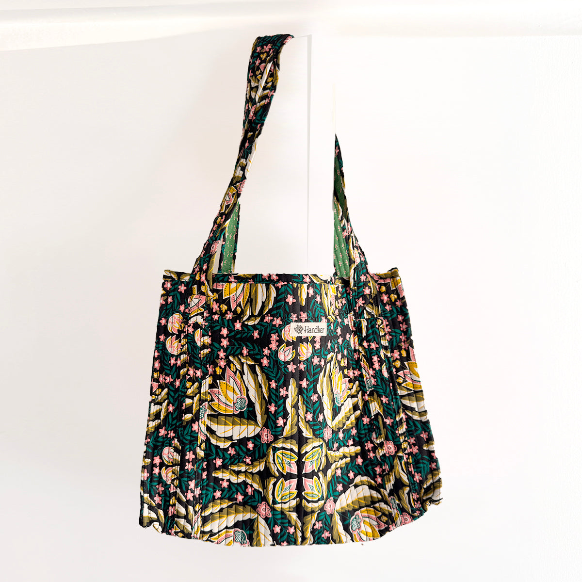 Floral patterned bag with Handker logo