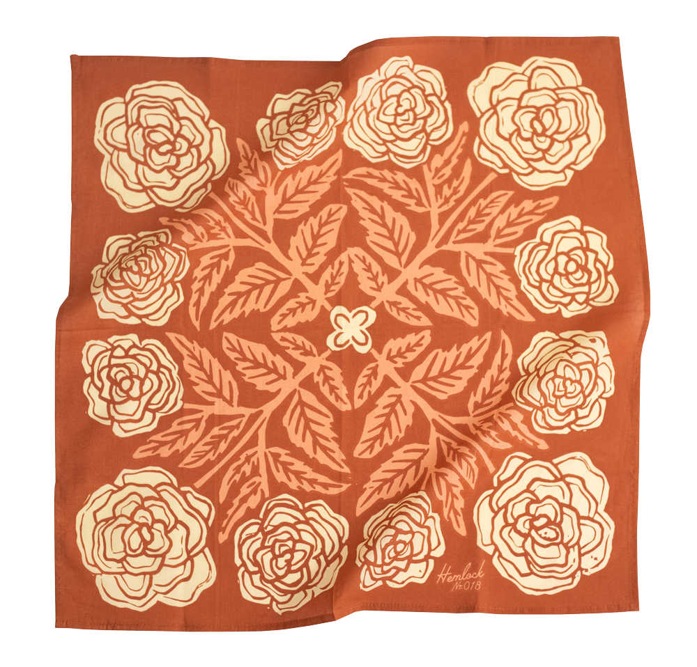 Red fabric with floral pattern and leaves