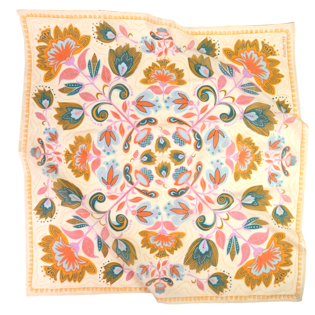 A square cotton bandana featuring a vibrant, symmetrical floral and paisley pattern in orange, pink, teal, and olive green.