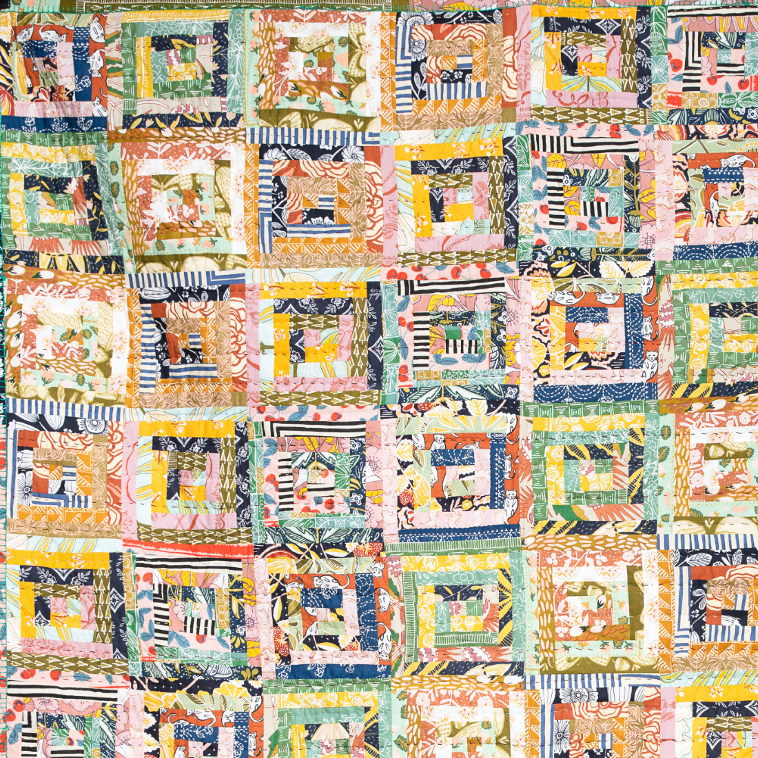 Colorful patchwork quilt with geometric patterns