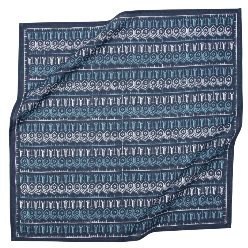 Blue and gray patterned fabric square with folded corner