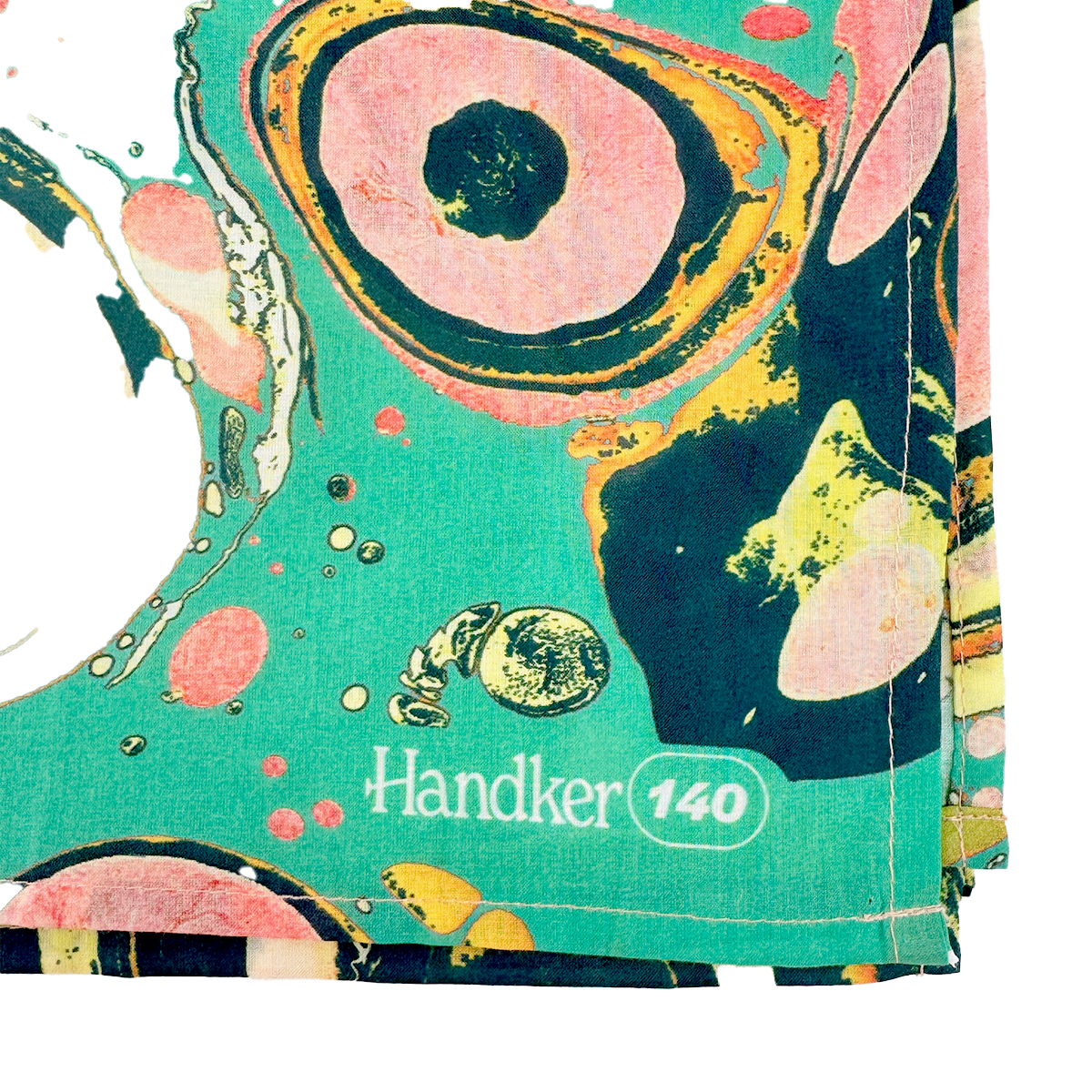 Printed teal and pink handkerchief corner with floral marbling and label 'Handker 140'.