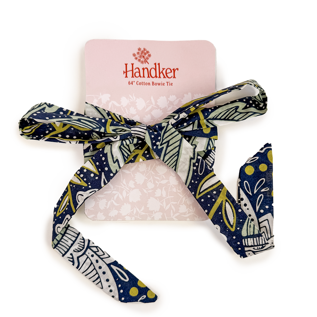 Navy, green and white patterned cotton bow tie on pink Handker card labeled 64" Cotton Bowie Tie