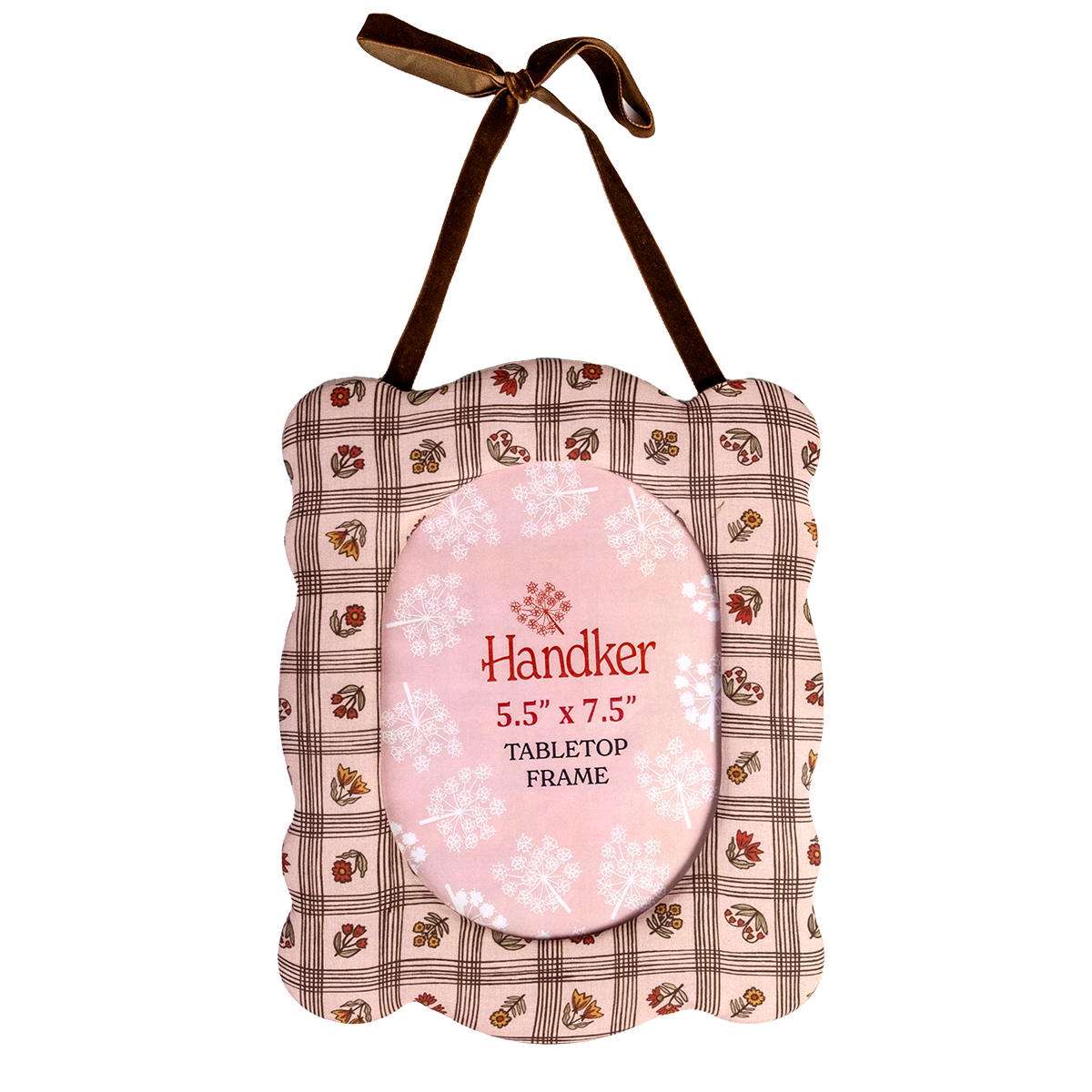 Front view of Laura Pink fabric-covered 8x10 desktop frame showcasing scalloped edges, 5.5 x 7.5 oval photo opening and brown hanging ribbon on white background