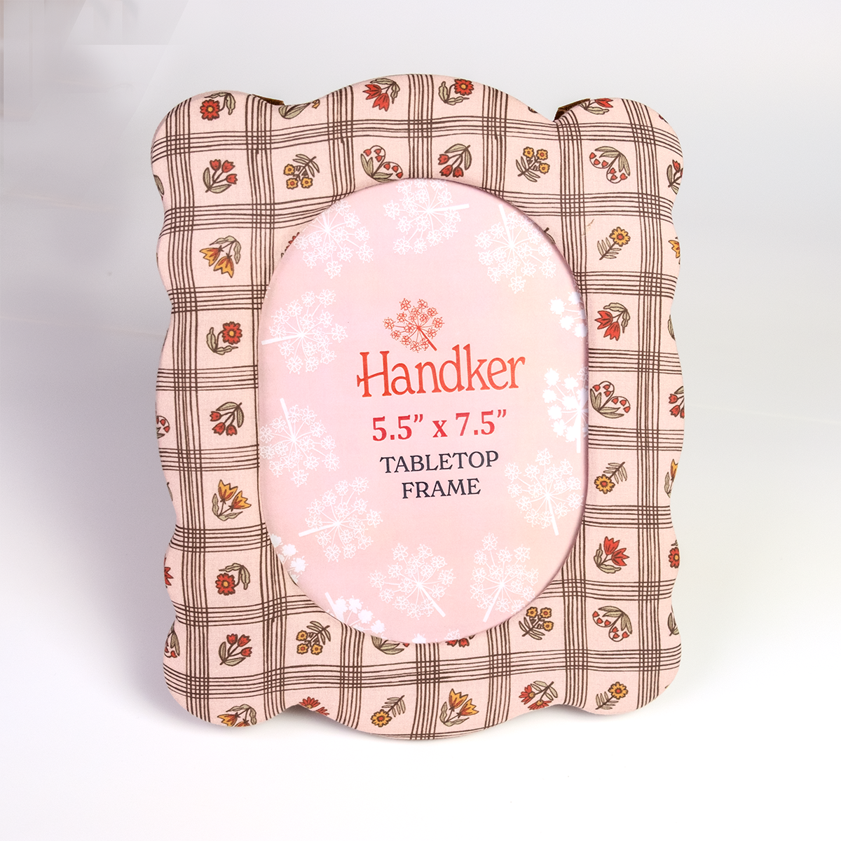 Front view of Laura Pink fabric frame showing scalloped floral-check cover and 5.5 x 7.5 inch oval photo opening on white