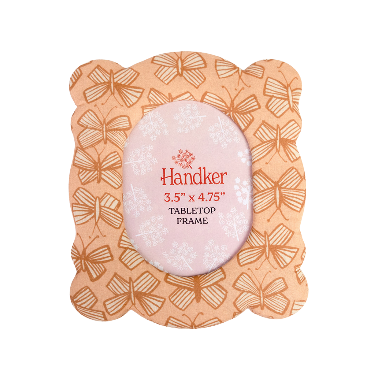 Front view of Sally fabric desktop frame with peachy pink butterfly pattern, oval 3.5 x 4.75 in photo opening, fabric-covered