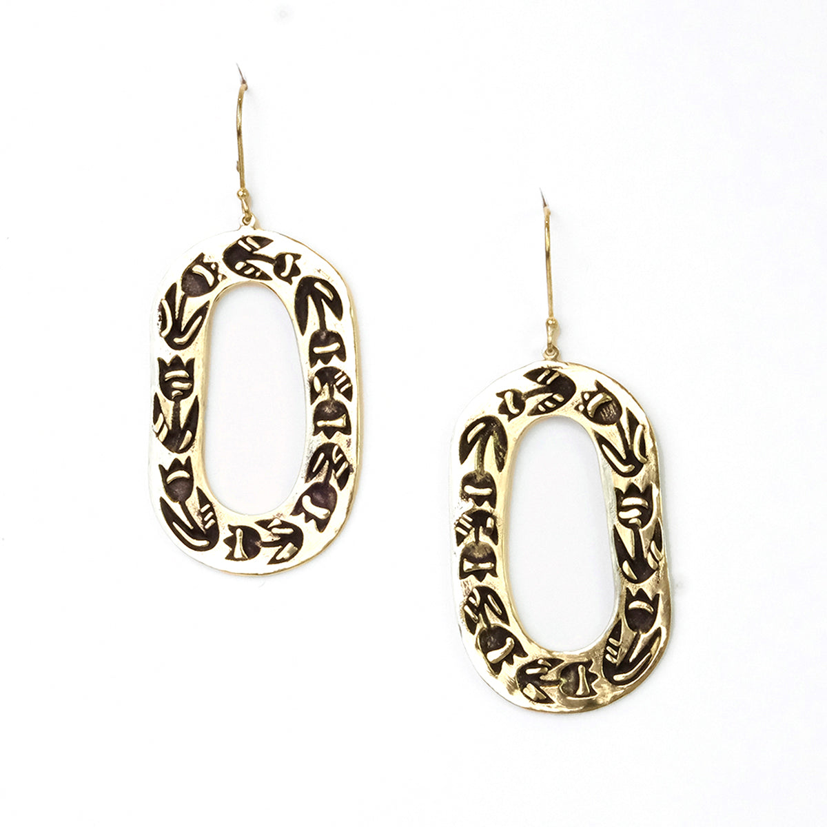 Gold oval earrings with floral patterns