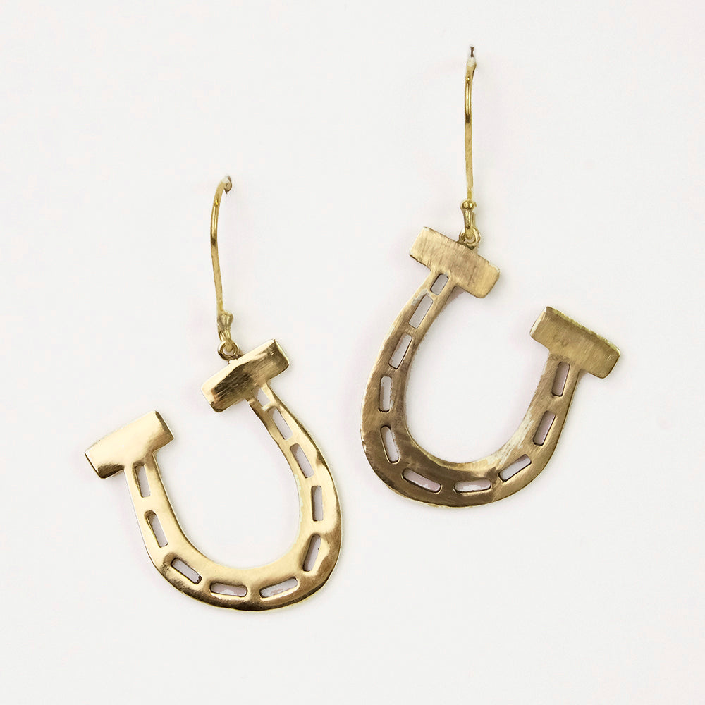 Gold horseshoe-shaped earrings with hook clasps