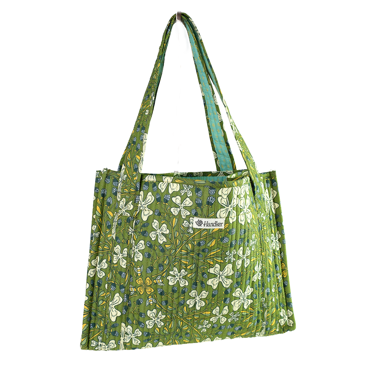 Green floral-patterned tote bag on a white background