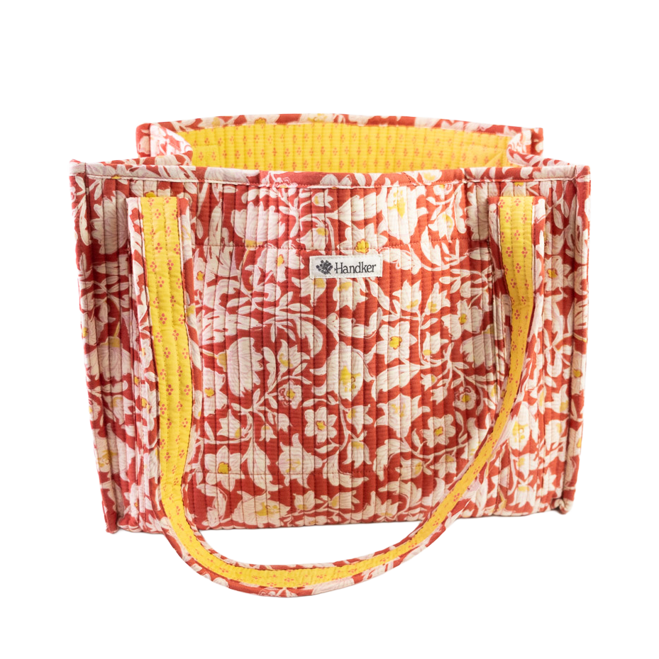 Red tote bag with beige and yellow floral designs