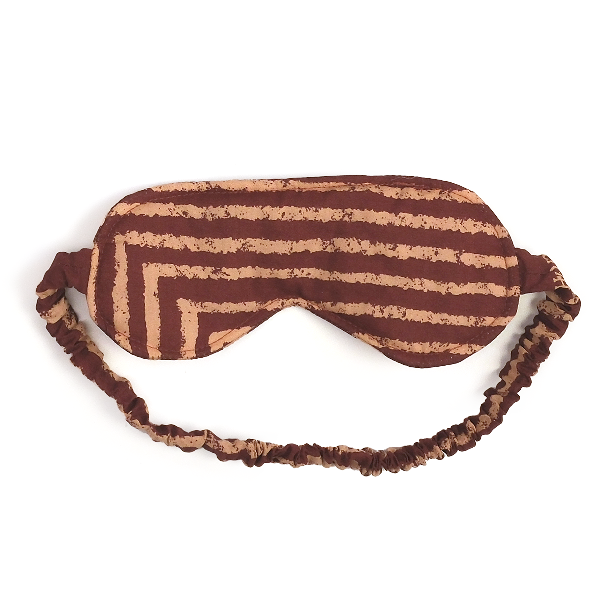 Striped brown and tan sleep mask with ruched elastic strap