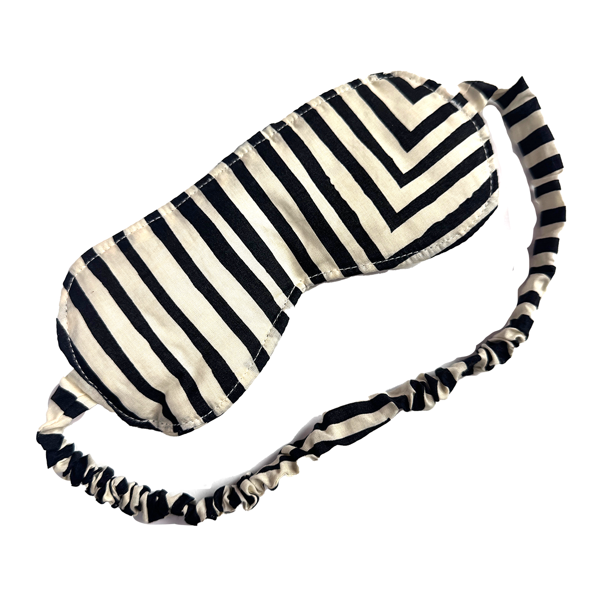 Black-and-white striped fabric sleep mask with elastic gathered strap