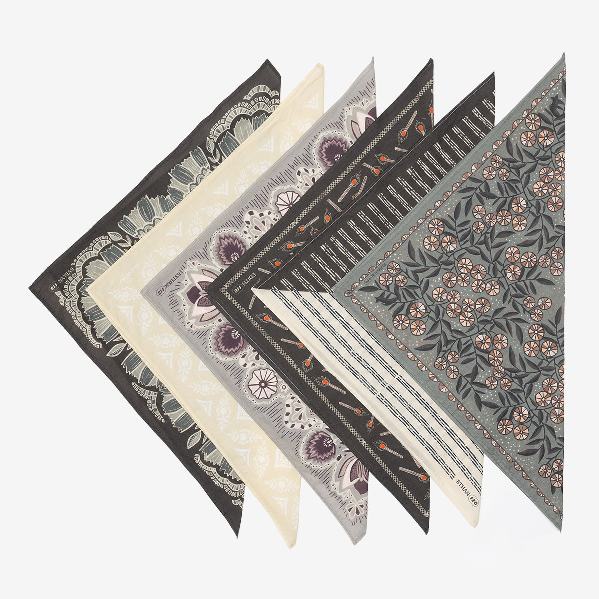 Set of six patterned triangular bandanas in various colors and designs.